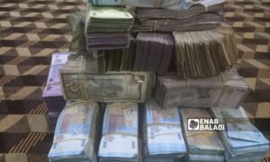 أوراق نقدية من العملة السورية (عنب بلدي)